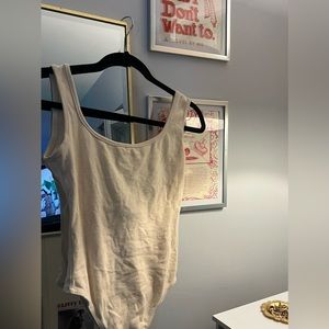 Cream open back body suit